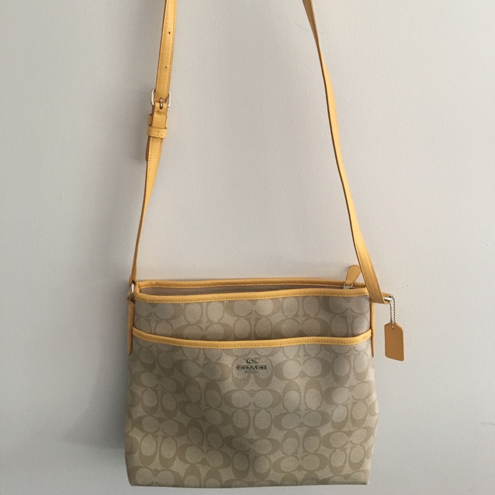 Coach yellow cross body purse